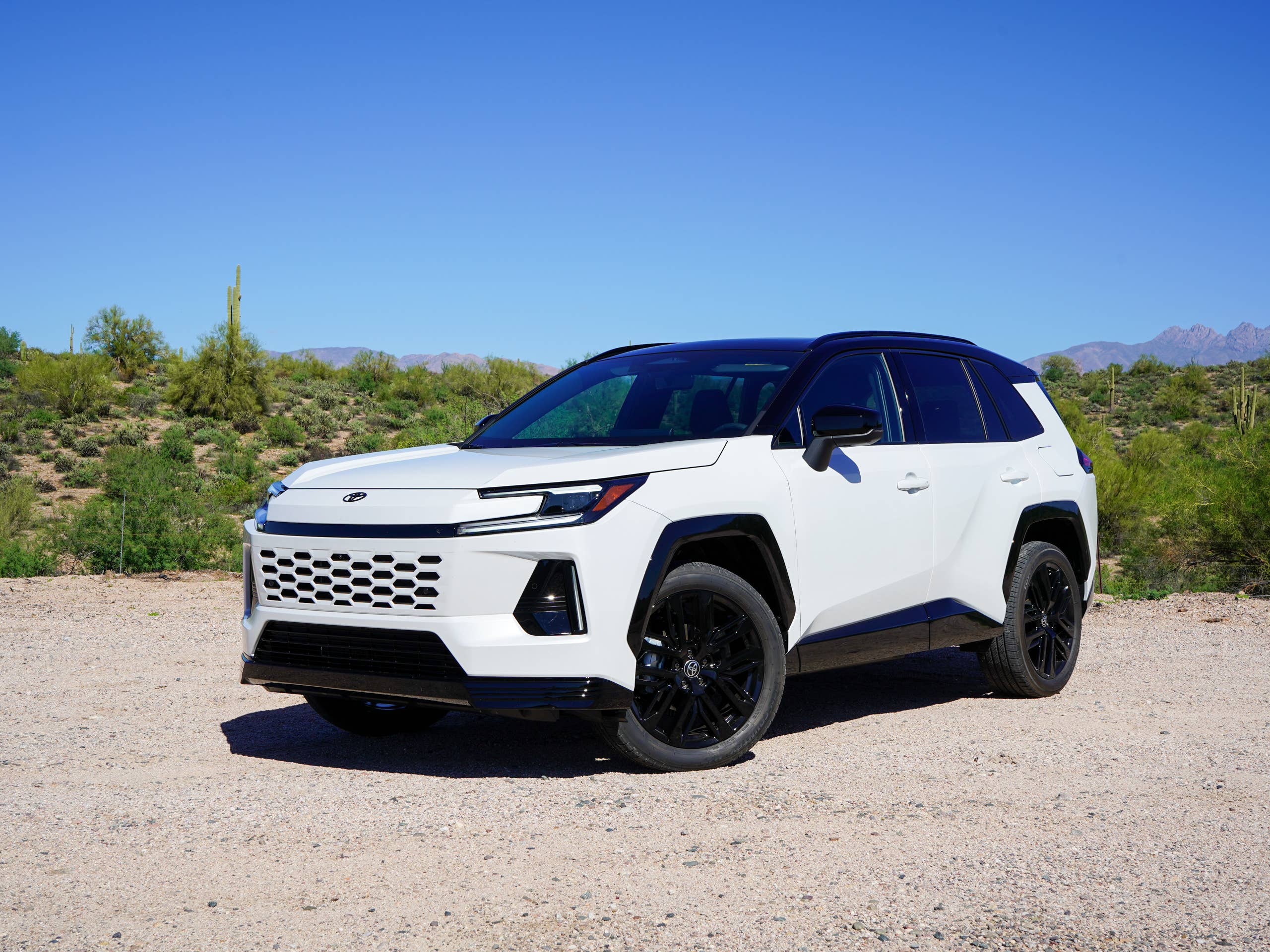 2026 Toyota RAV4 Hybrid SUV in desert landscape