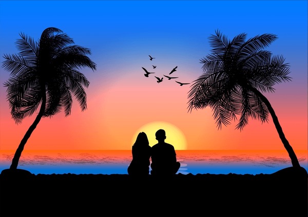 Couple at beach sunset