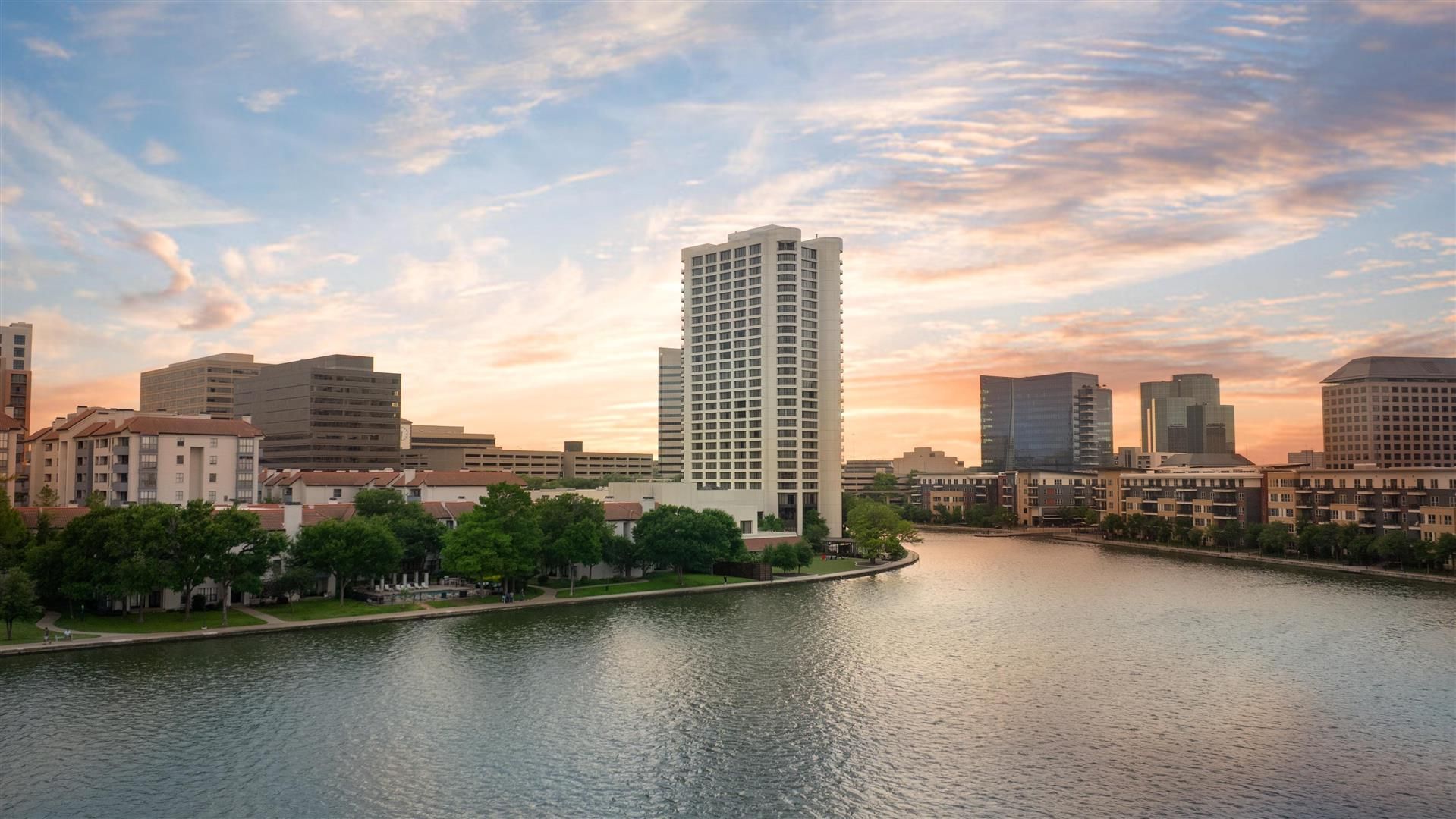 Las Colinas canal waterfront with Williams Square skyline, Irving TX