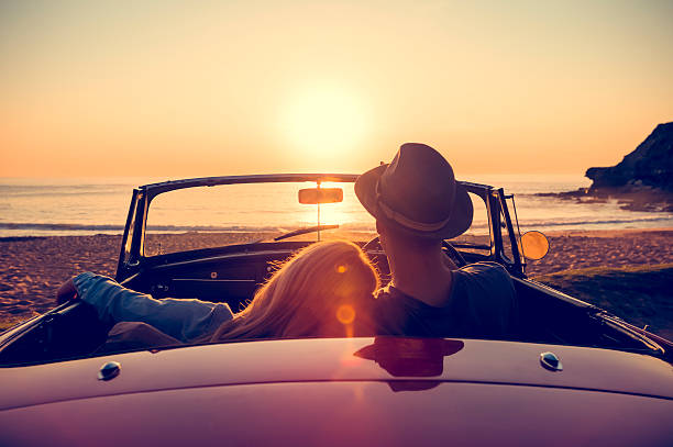 Couple in vintage convertible