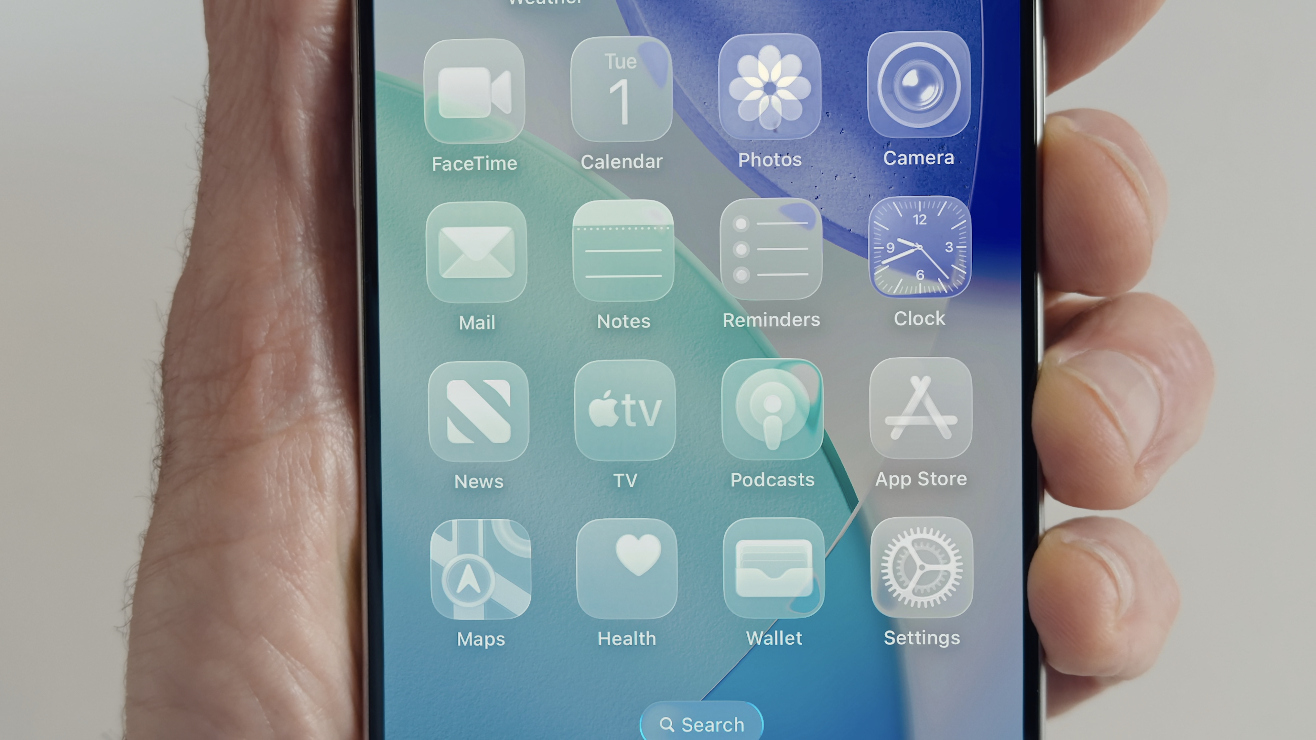 Pantalla de inicio de iOS 26 mostrando la disposición de aplicaciones