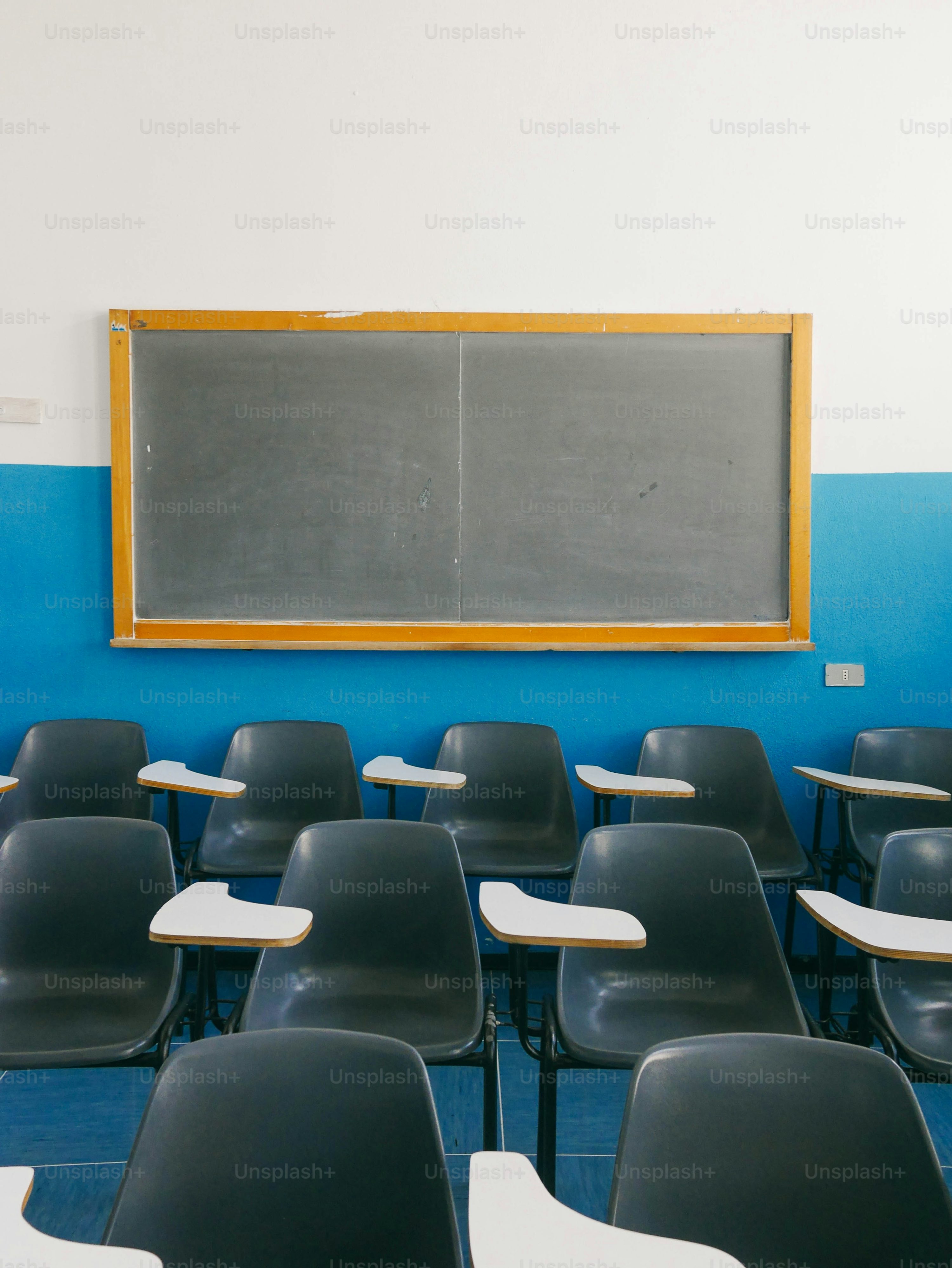 Empty classroom with rows of desks