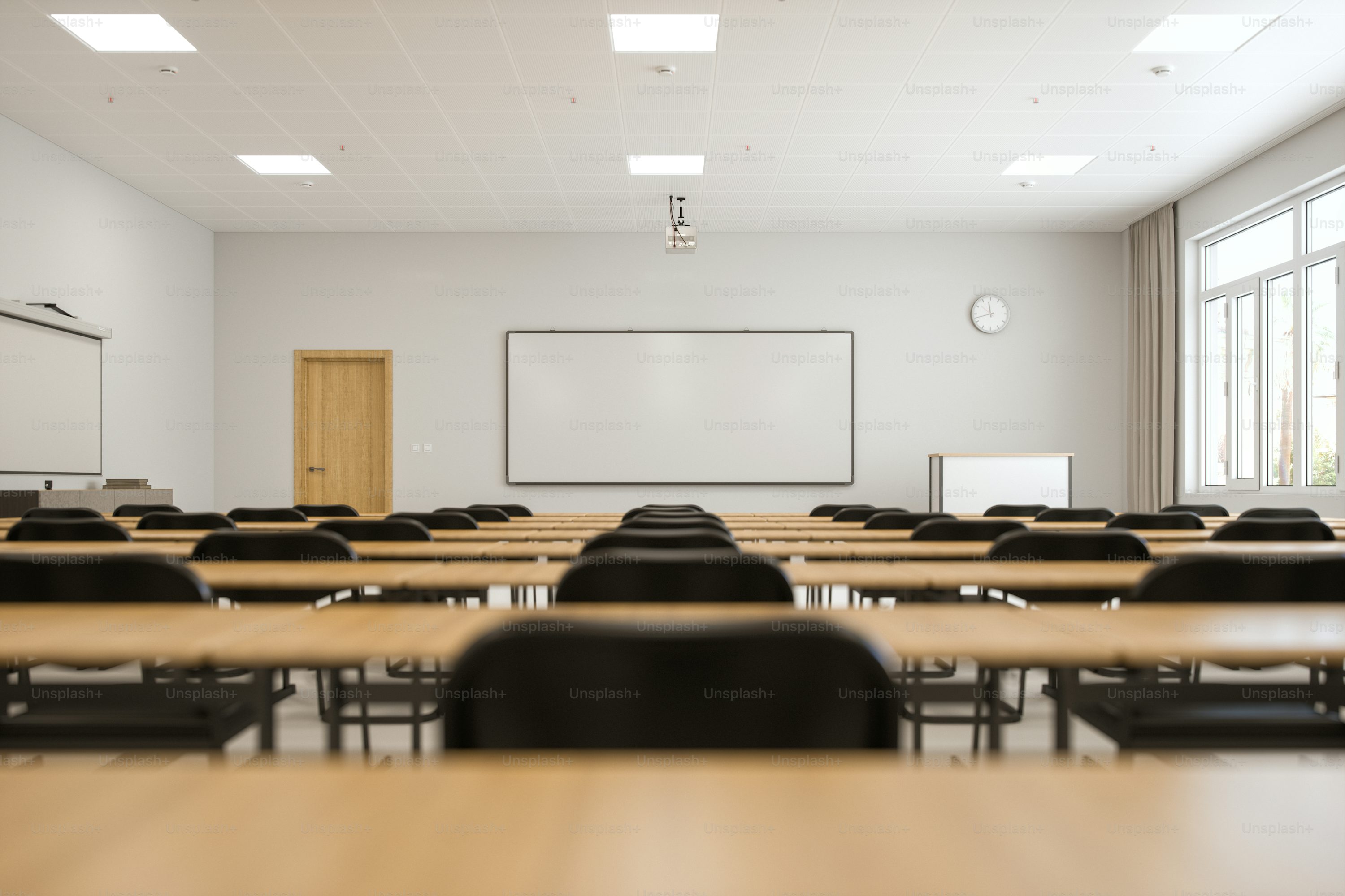 Modern classroom with desks and chalkboard