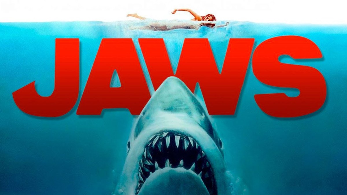 Cartel de la película Tiburón con el tiburón aproximándose a una persona en el agua
