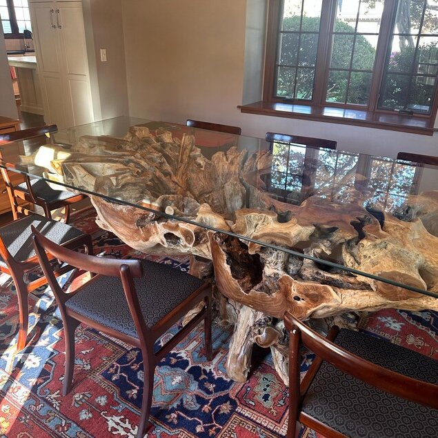 Tree root table with glass top
