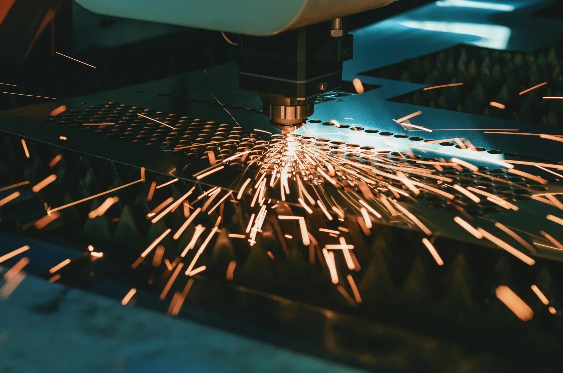 Precision laser cutting head in action