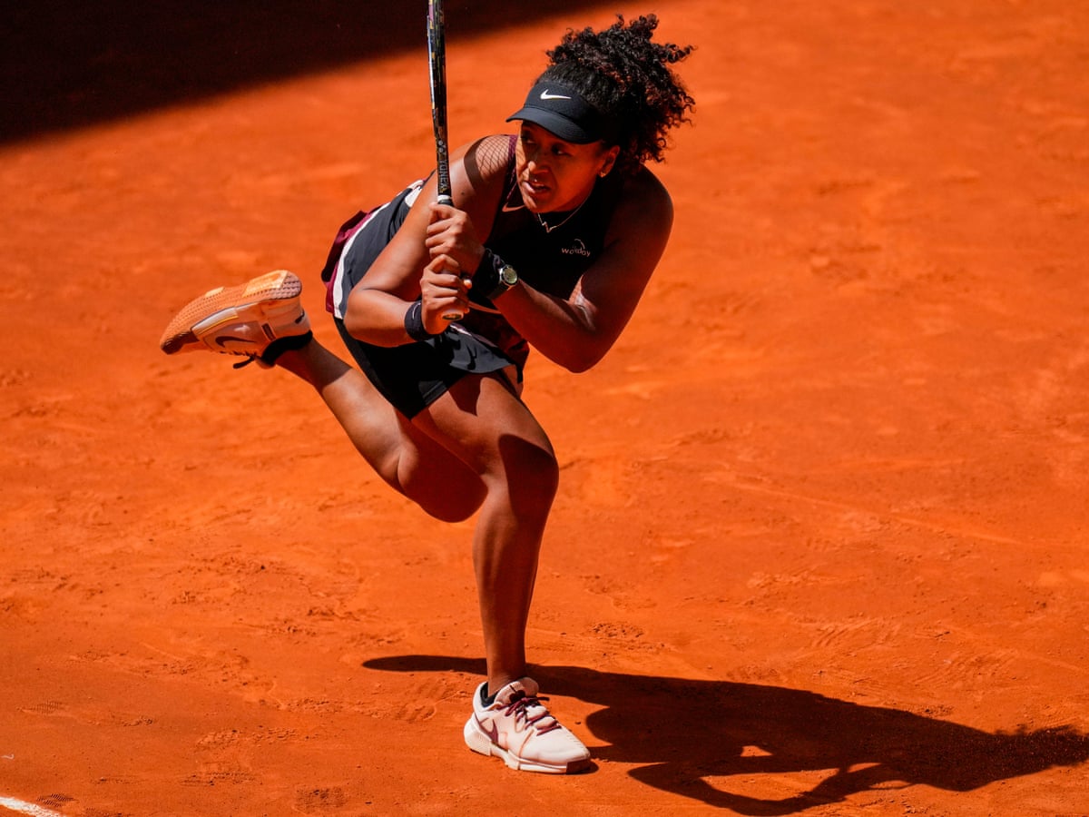 Tennis player hitting a forehand on court